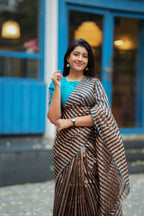 Black & copper stripped tissue saree with bird work blouse