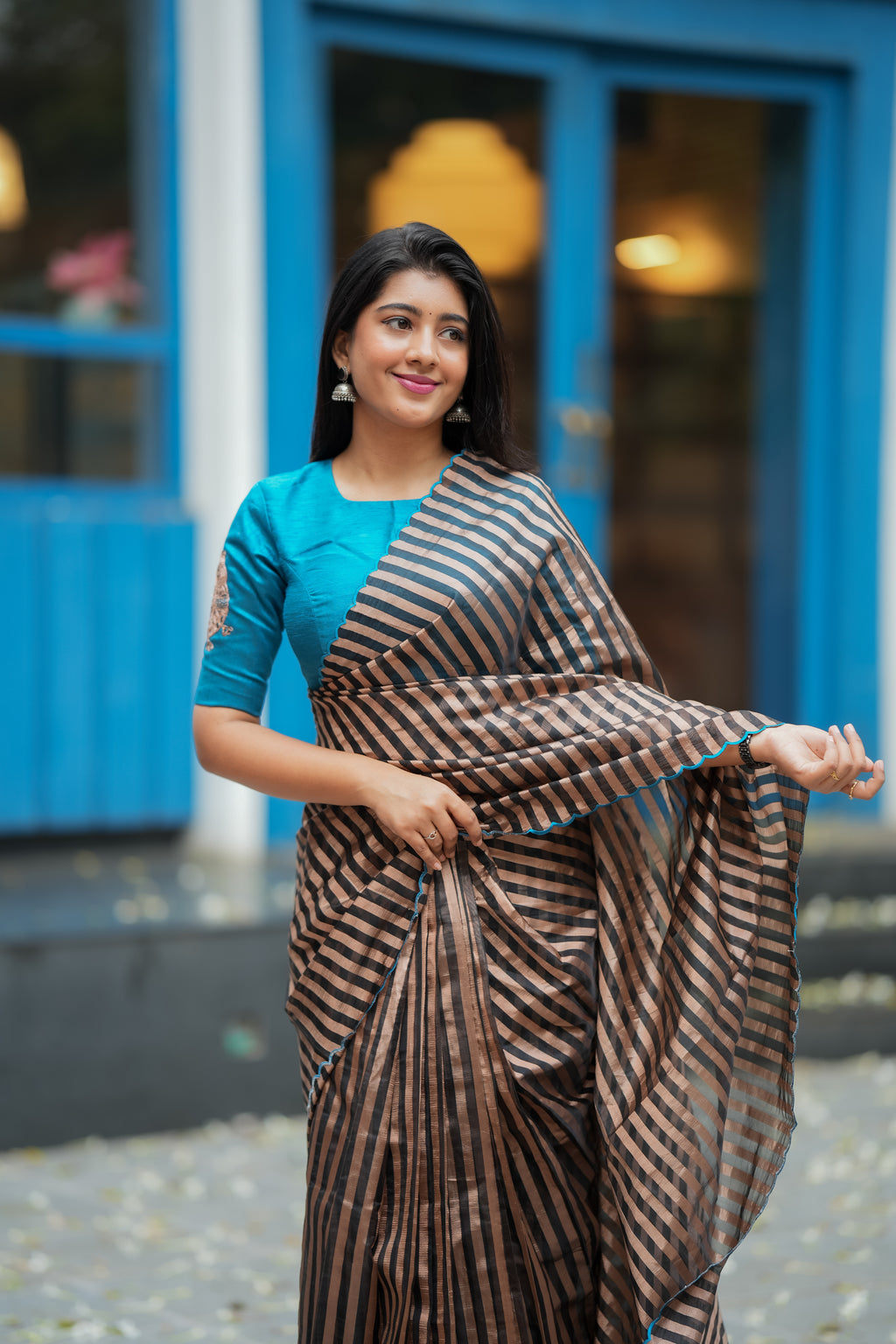 Black & copper stripped tissue saree with bird work blouse