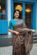 Black & copper stripped tissue saree with bird work blouse