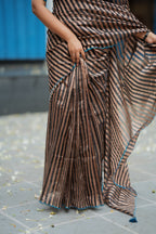 Black & copper stripped tissue saree with bird work blouse