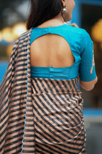 Black & copper stripped tissue saree with bird work blouse