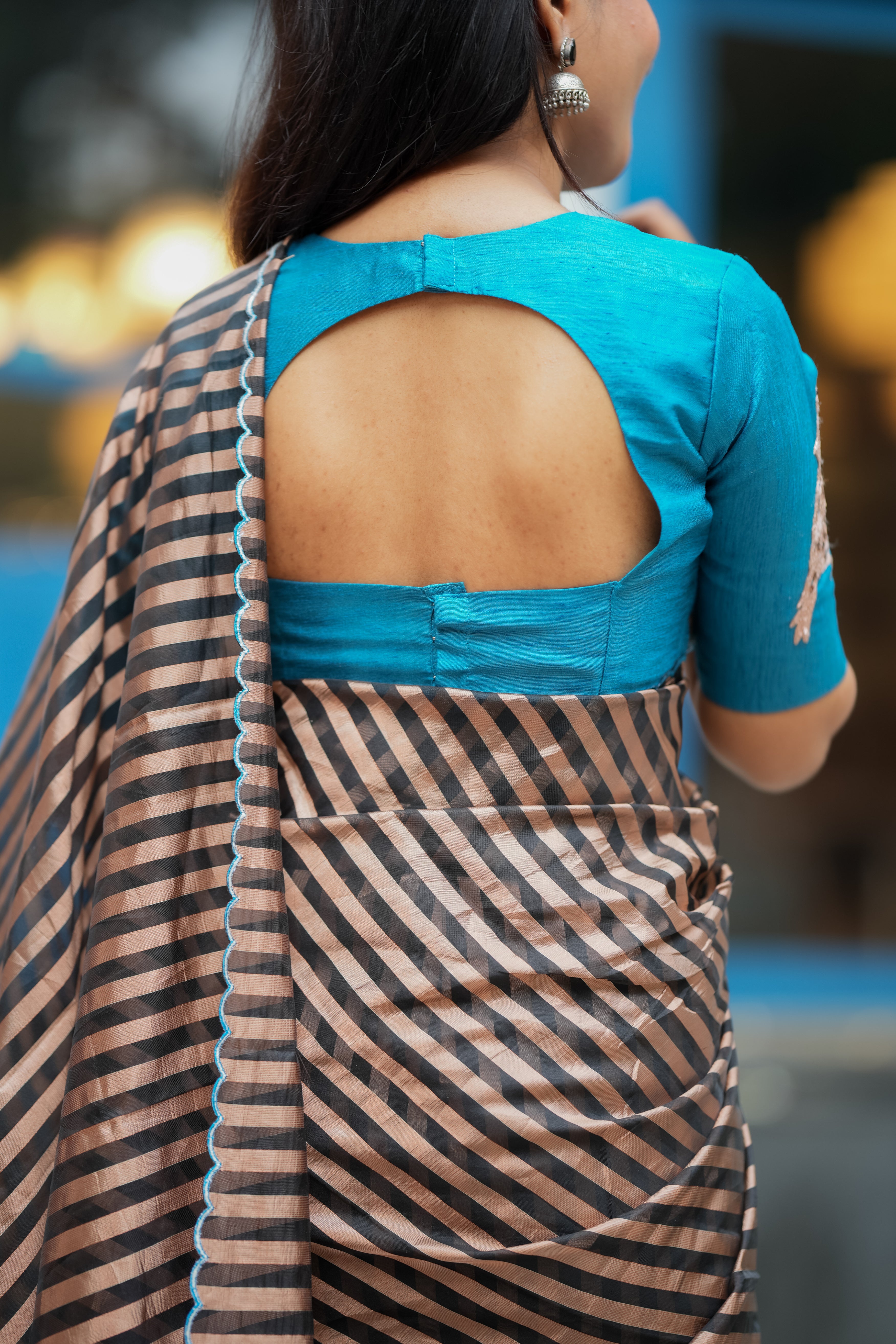 Black & copper stripped tissue saree with bird work blouse