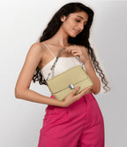 Women green textured sling bag