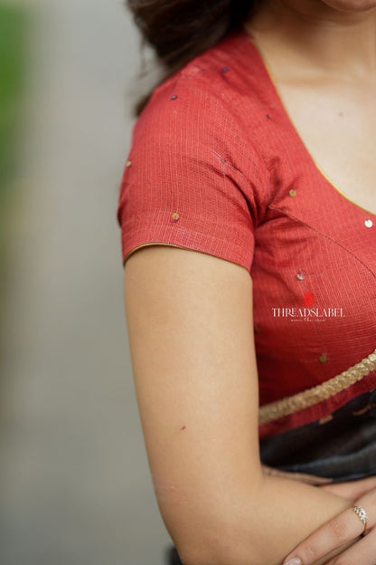 Black cow kota saree with paisley hand work blouse