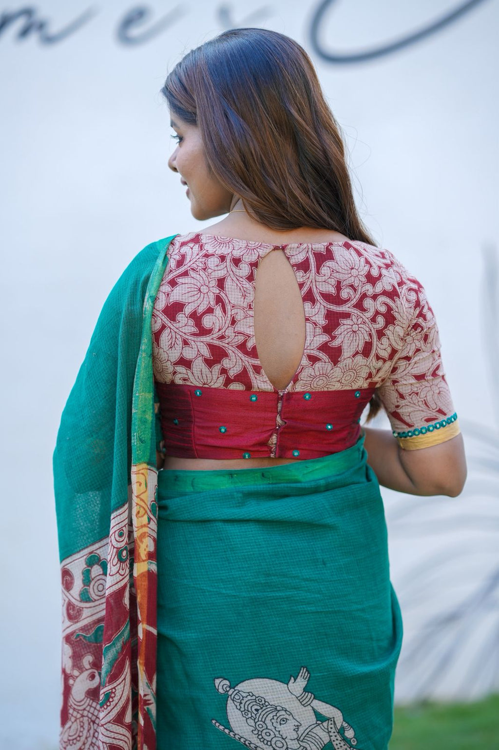 Green kota saree with kalamkari work blouse