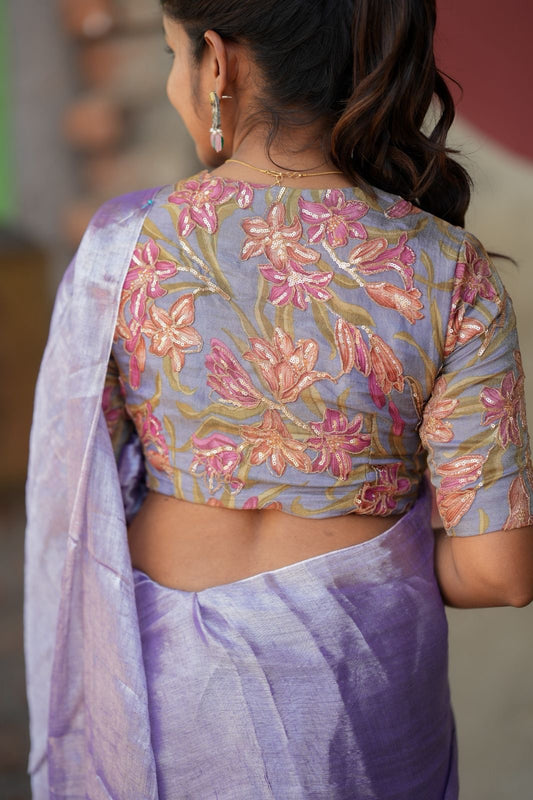 Lavender soft tissue saree with embroidered blouse