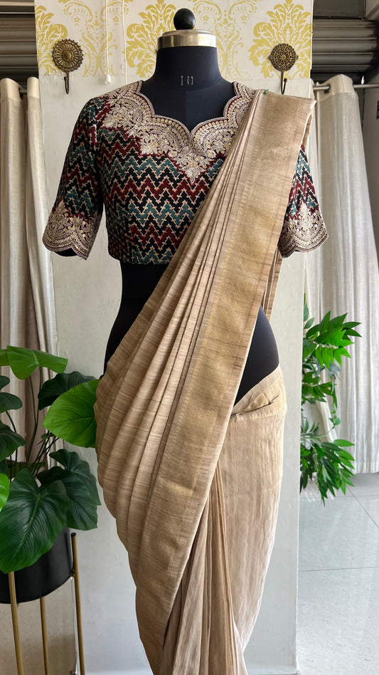 Golden cream tissue saree with ajrak embroidery blouse