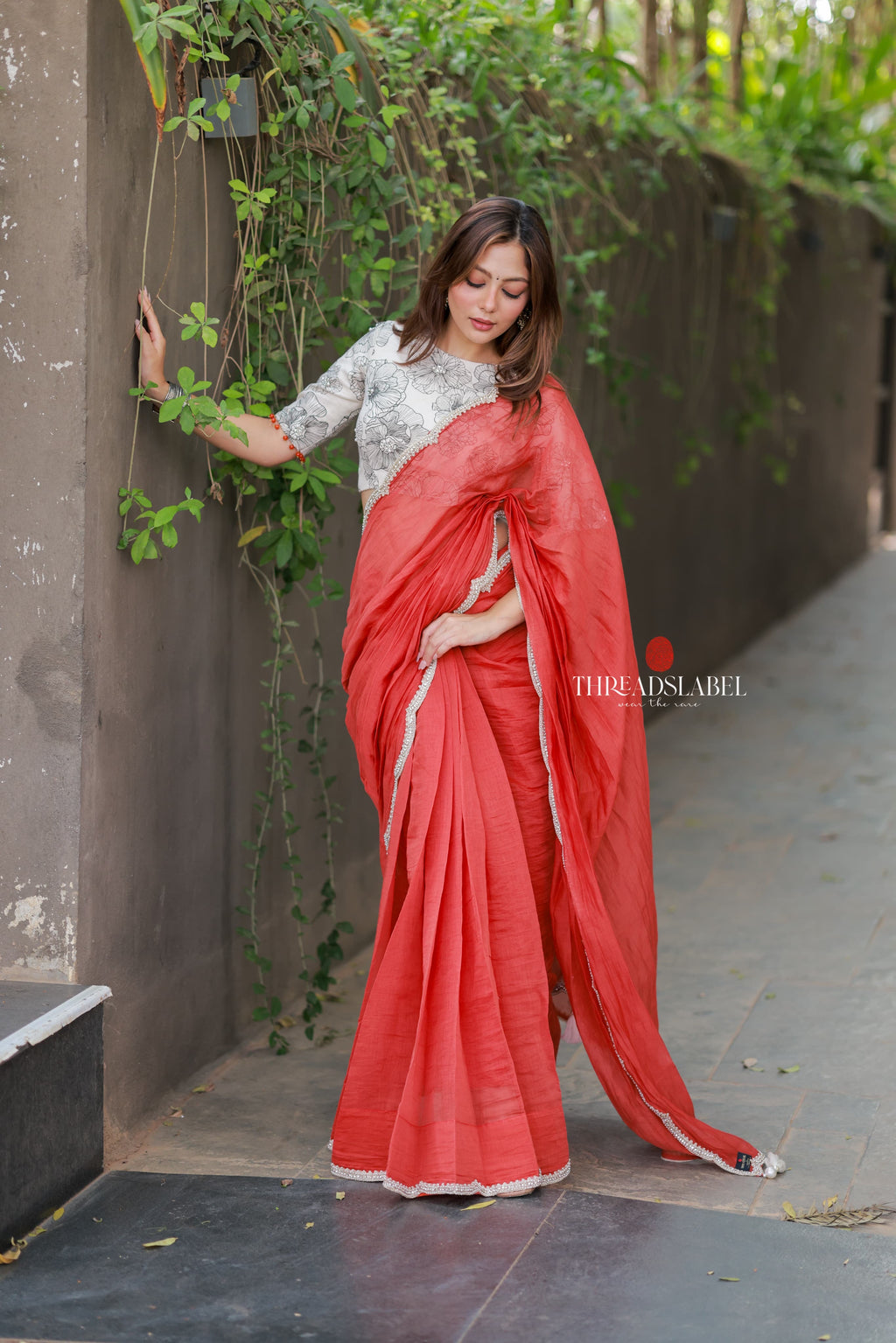 Orange rust saree with pearl work blouse