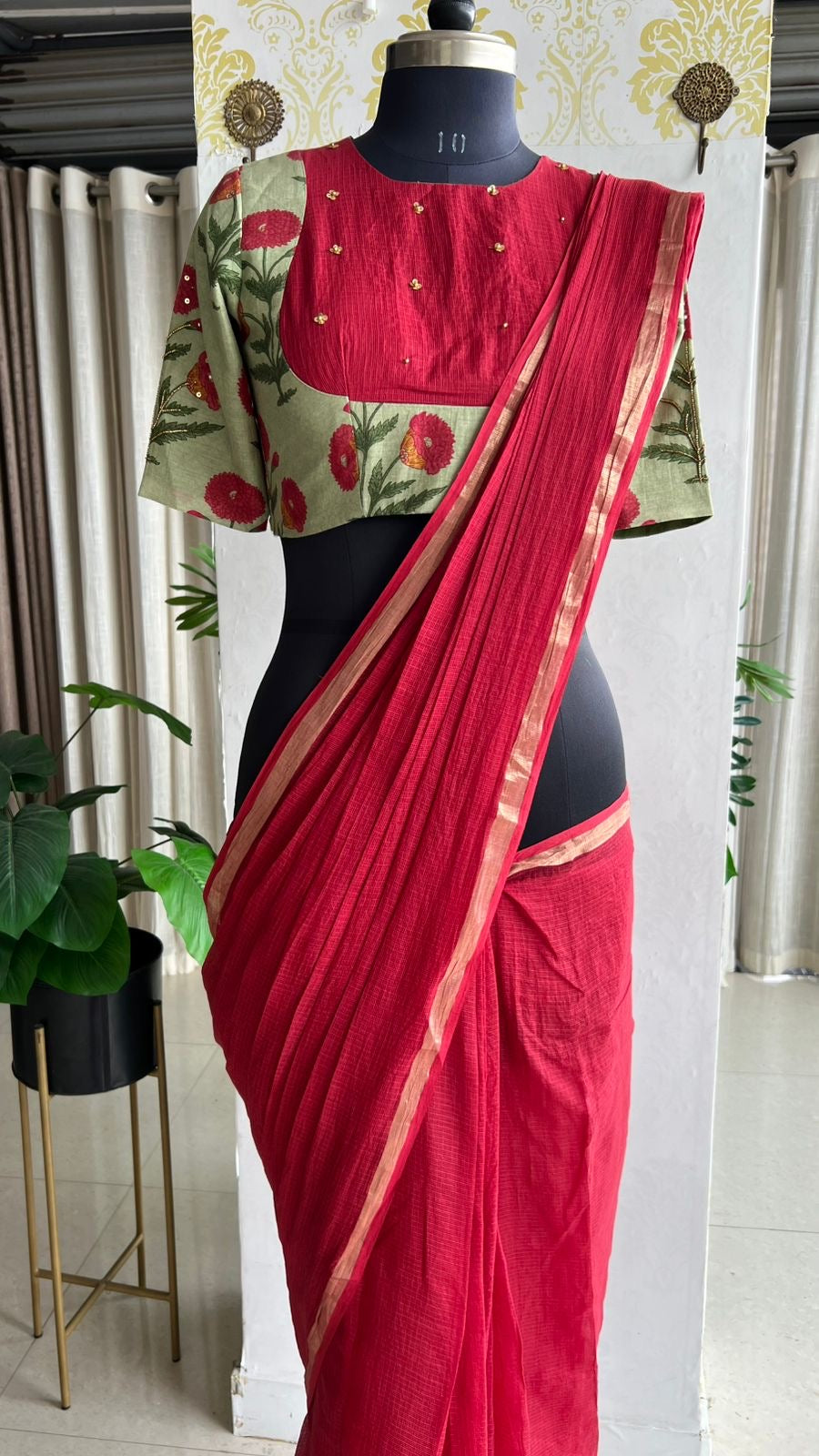 Maroon pure kota saree with green hand work blouse