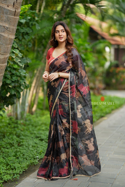 Black cow kota saree with paisley hand work blouse