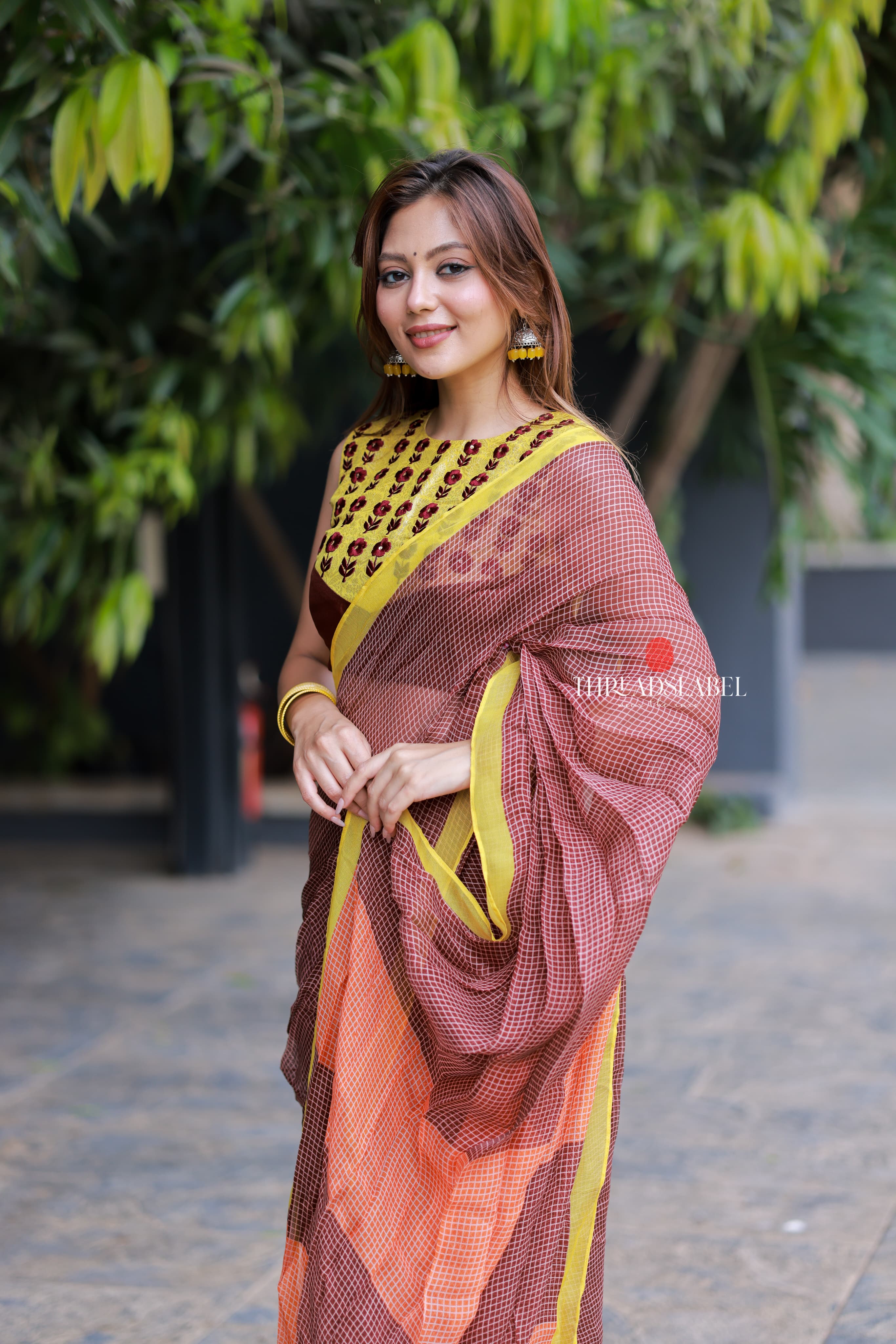 Brown jute saree with banarasi hand work blouse