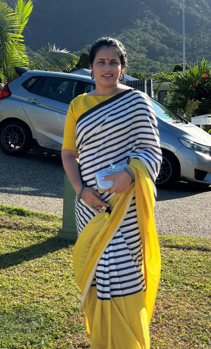 Black & white striped kossa saree with yellow embroidery blouse
