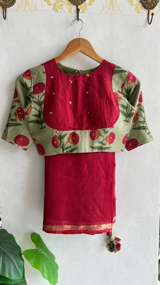 Maroon pure kota saree with green hand work blouse