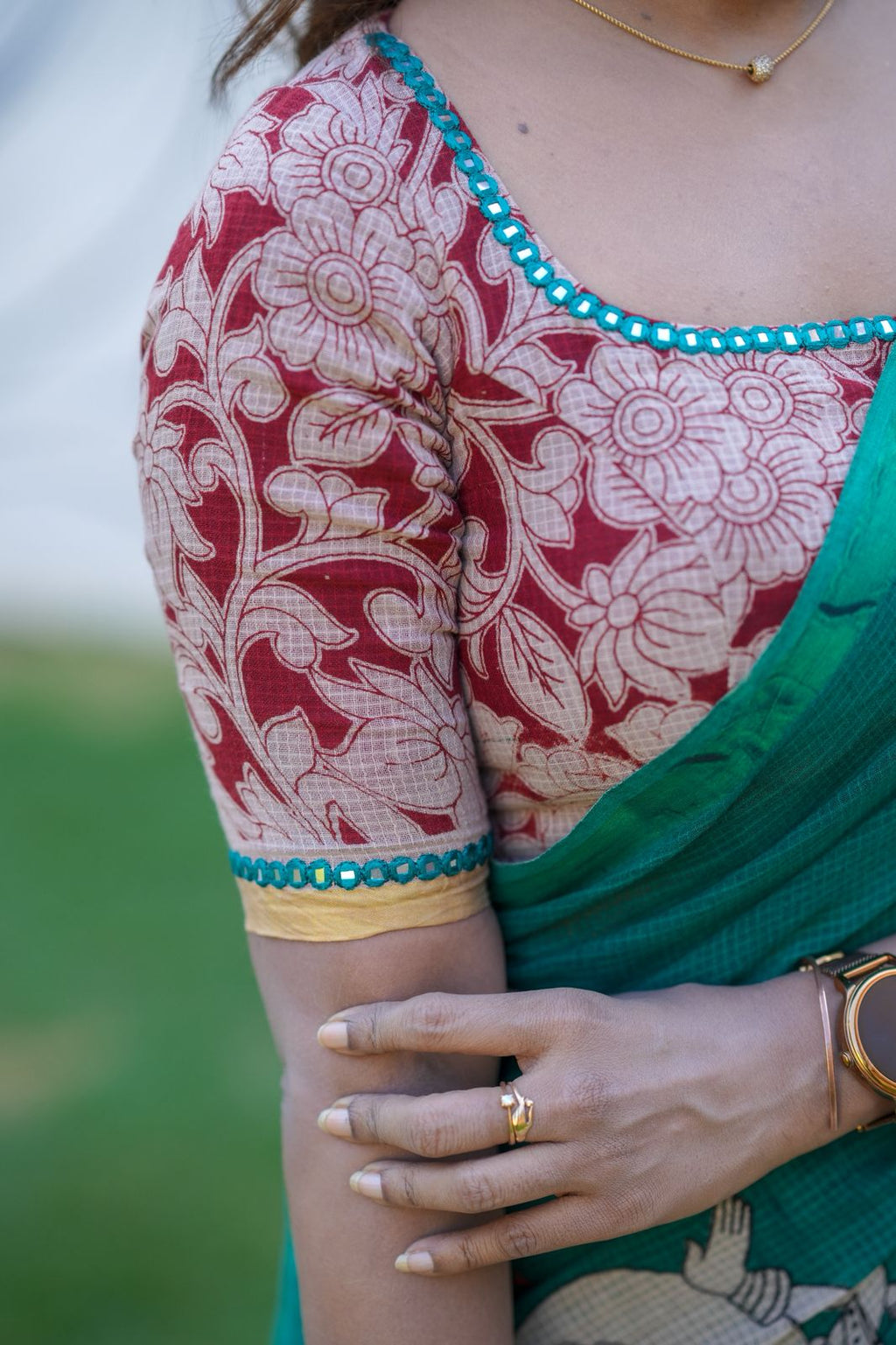 Green kota saree with kalamkari work blouse