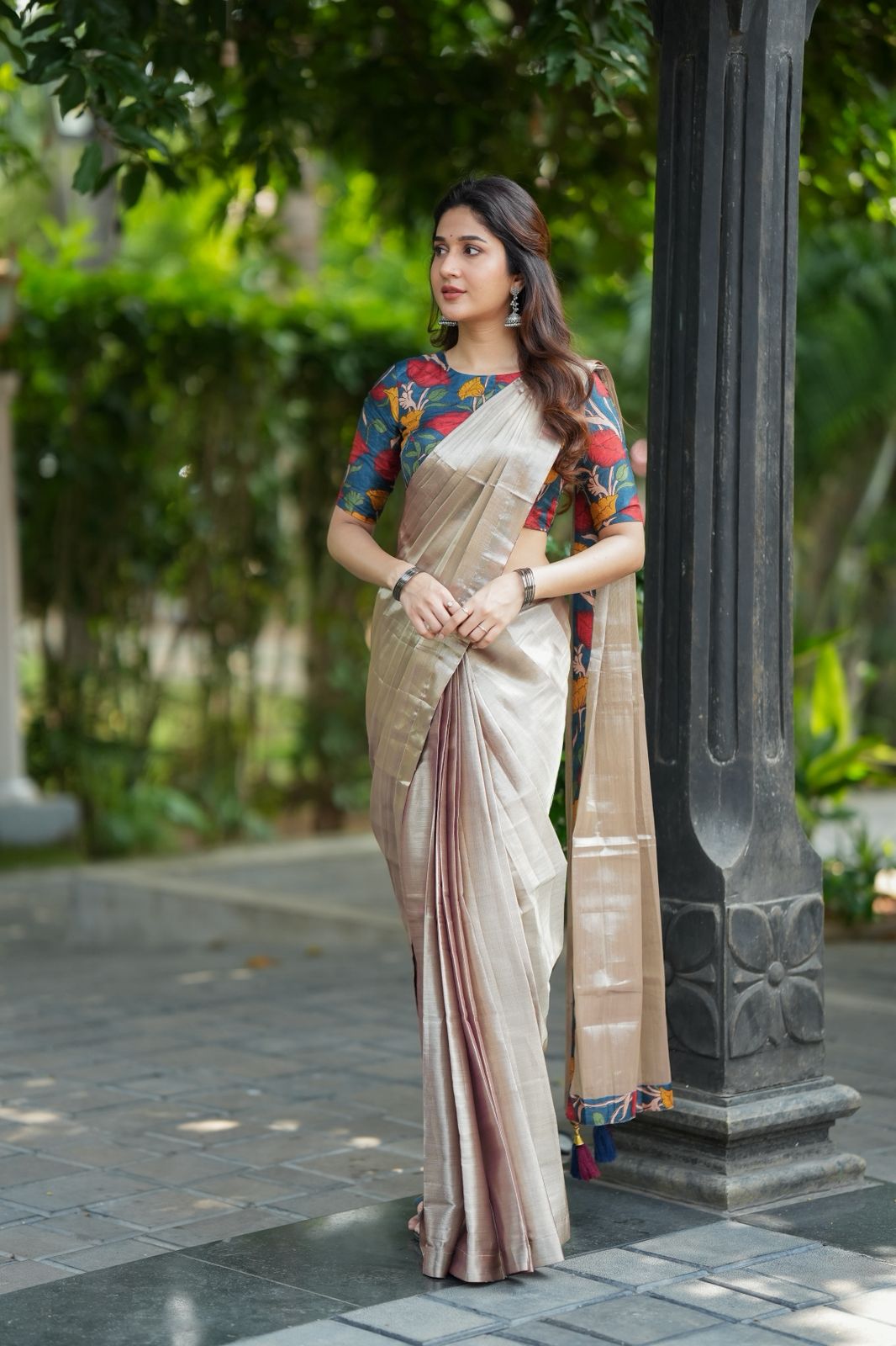 Silver soft tissue saree with blue kalamakari blouse