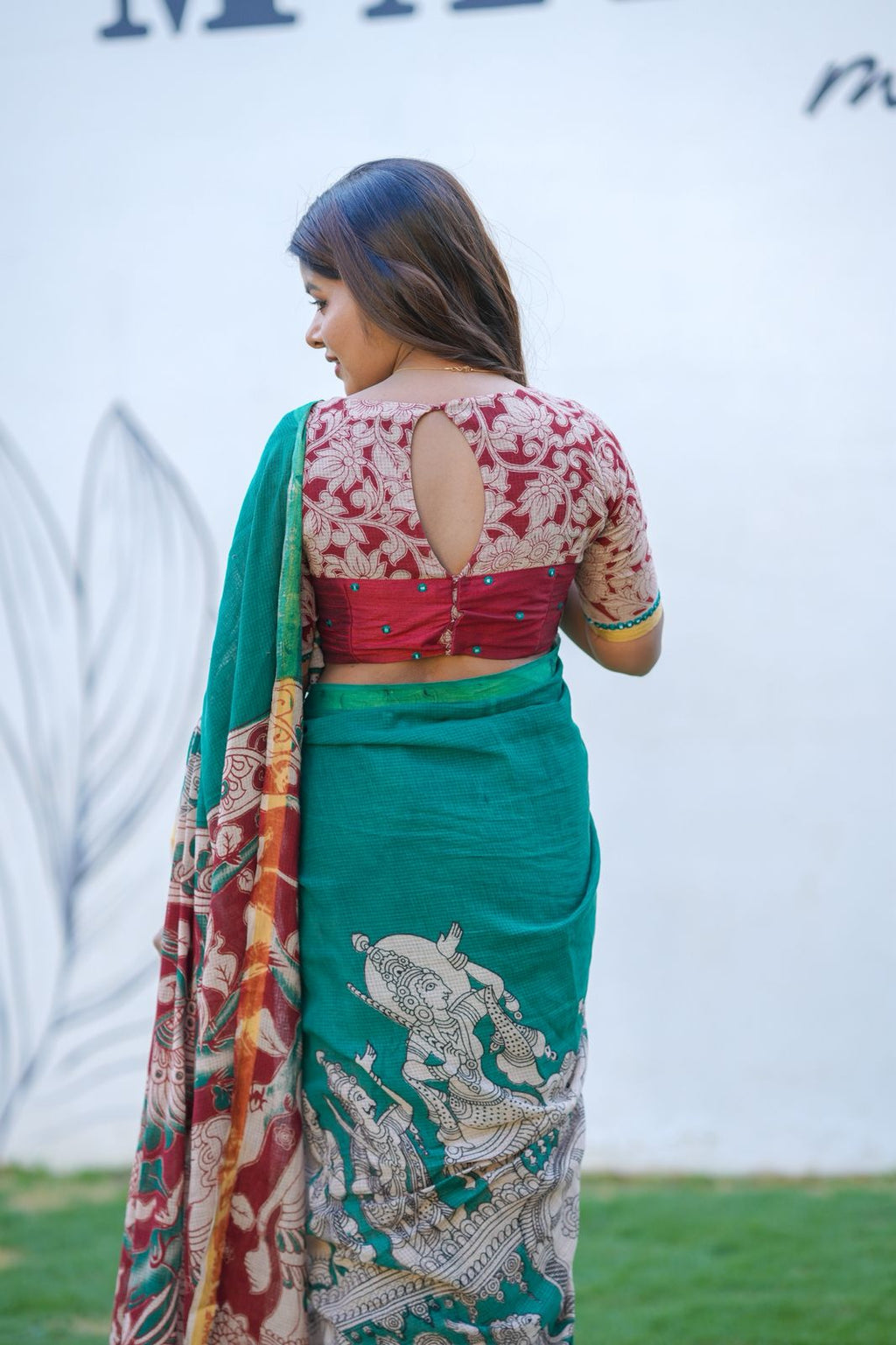 Green kota saree with kalamkari work blouse