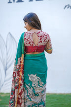 Green kota saree with kalamkari work blouse