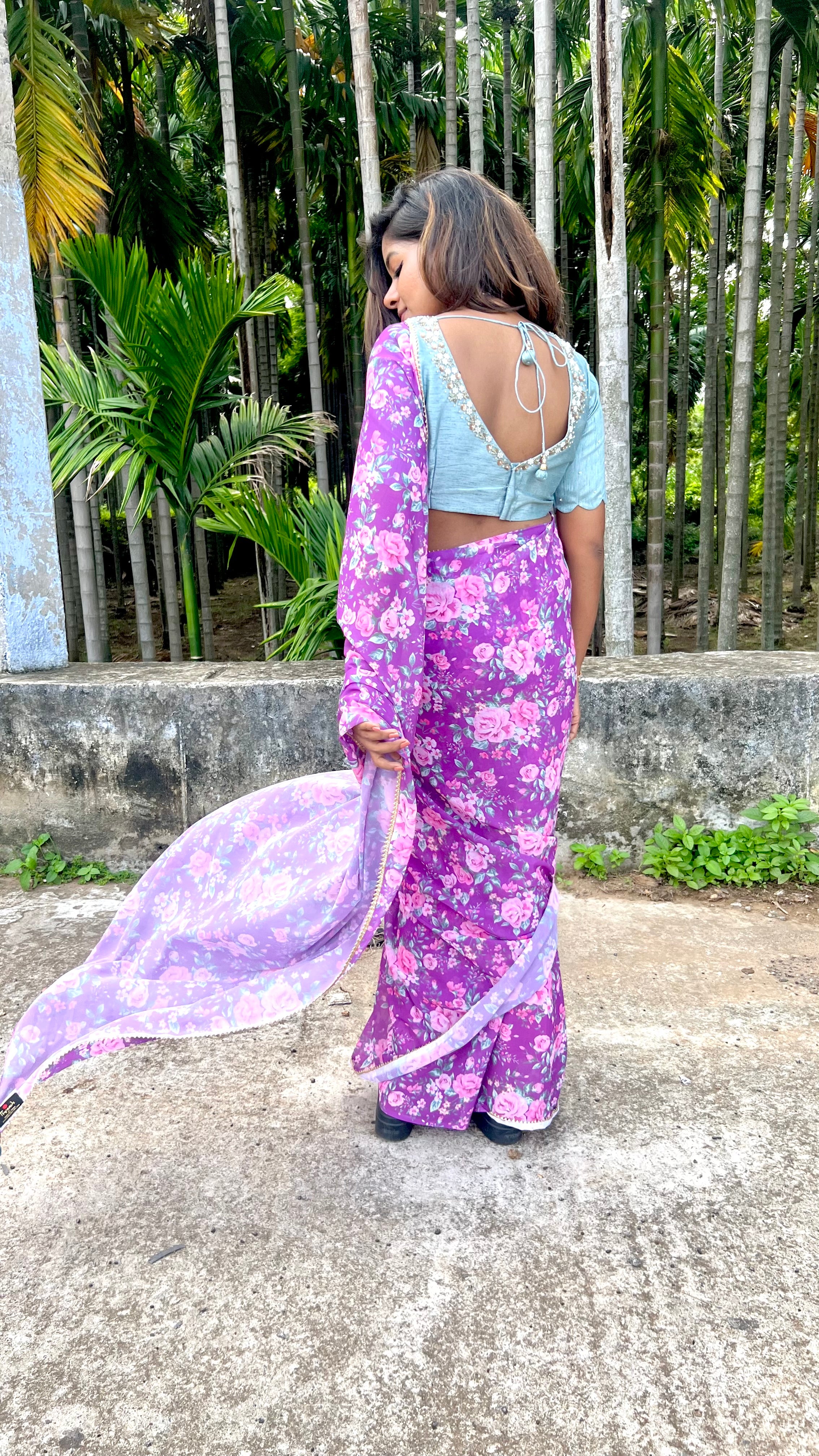 Purple floral georgette saree with hand worked blouse