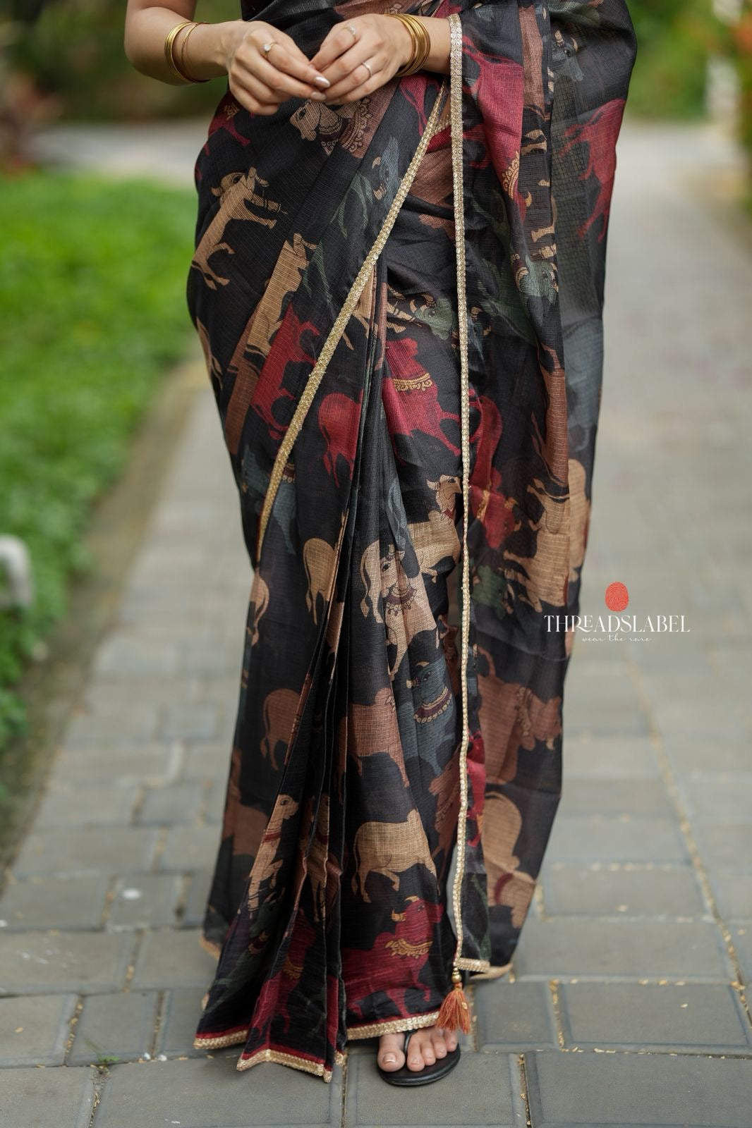 Black cow kota saree with paisley hand work blouse