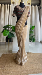 Golden cream tissue saree with ajrak embroidery blouse