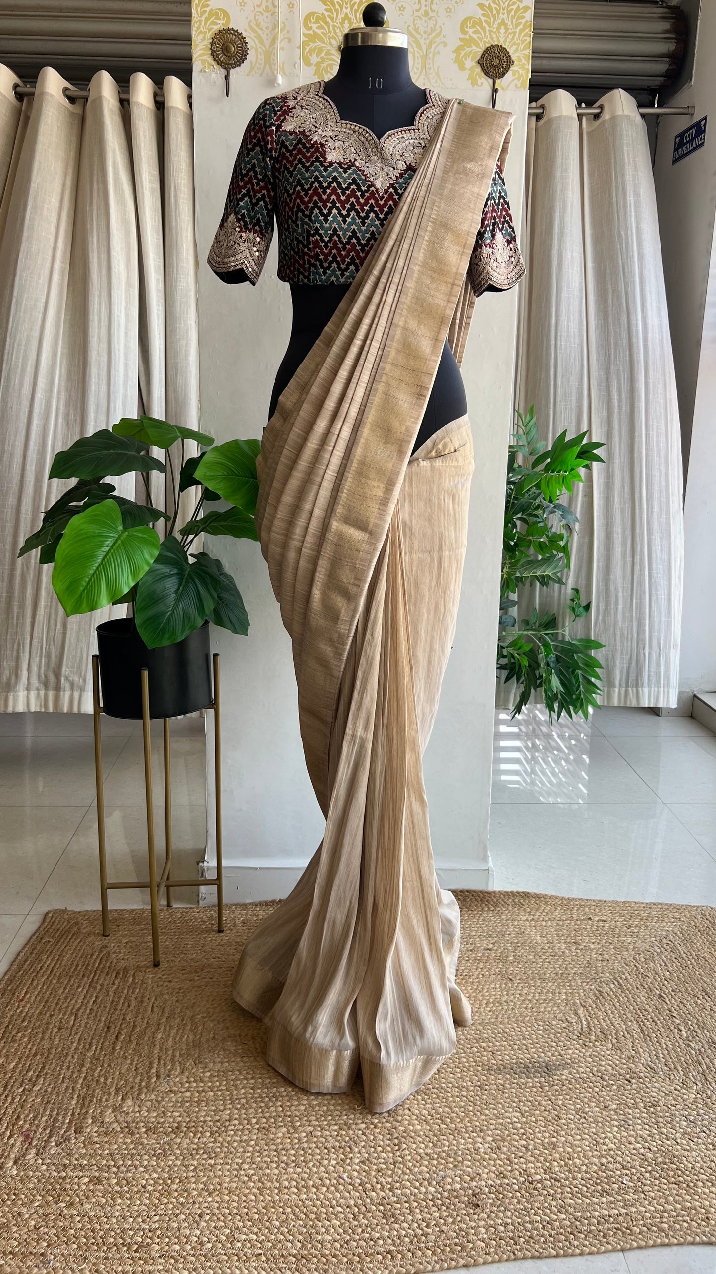 Golden cream tissue saree with ajrak embroidery blouse