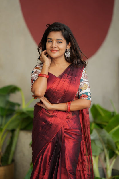 Wine soft tissue saree with floral blouse