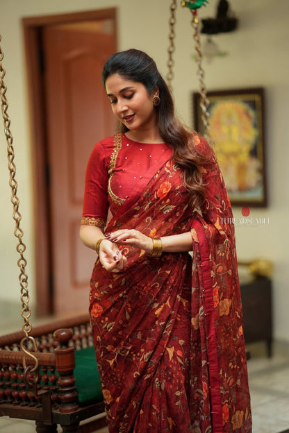 Maroon chiffon floral saree with hand work blouse