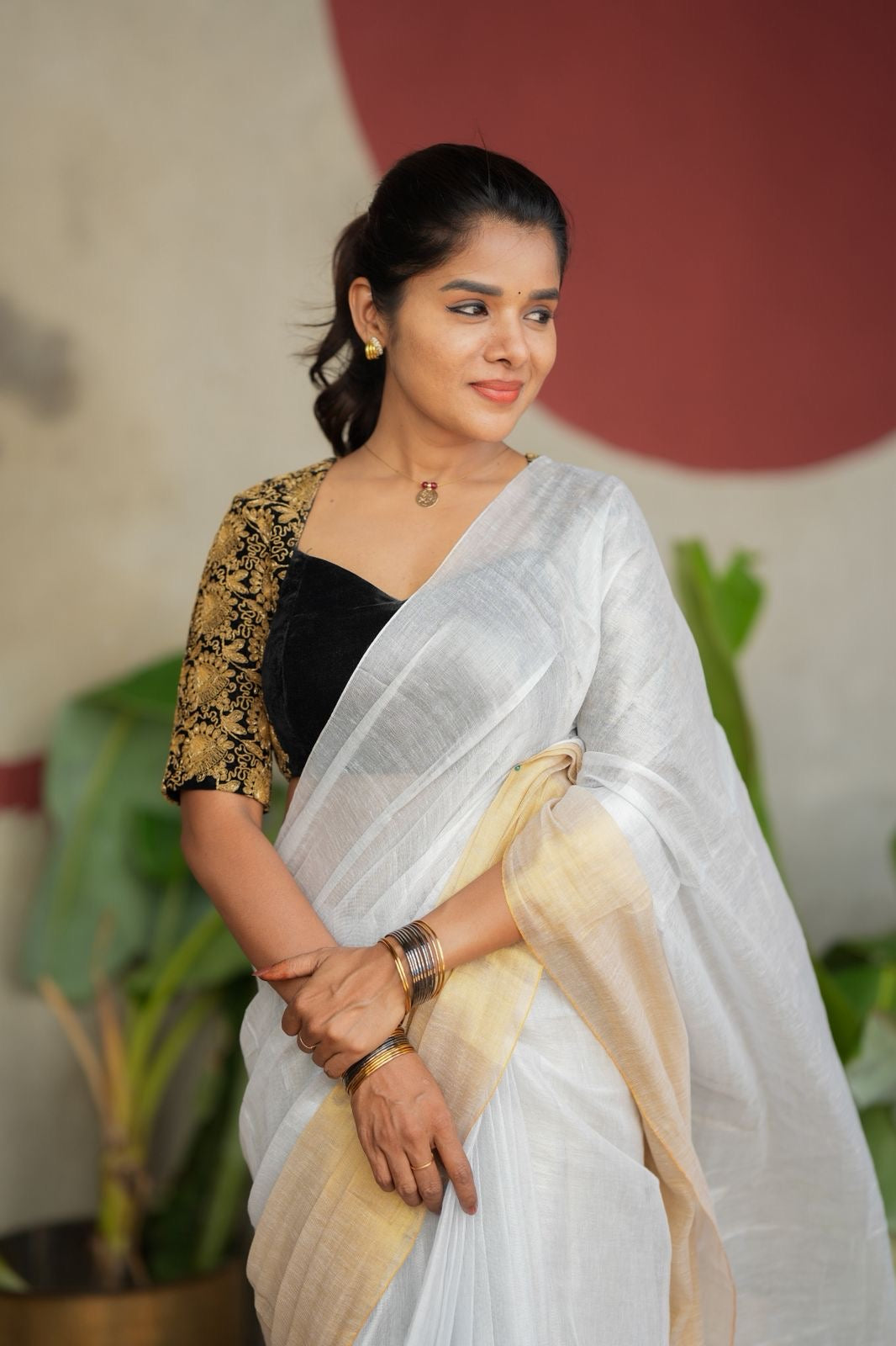 White soft tissue saree with heavy embroidery blouse