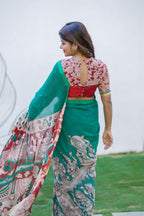 Green kota saree with kalamkari work blouse