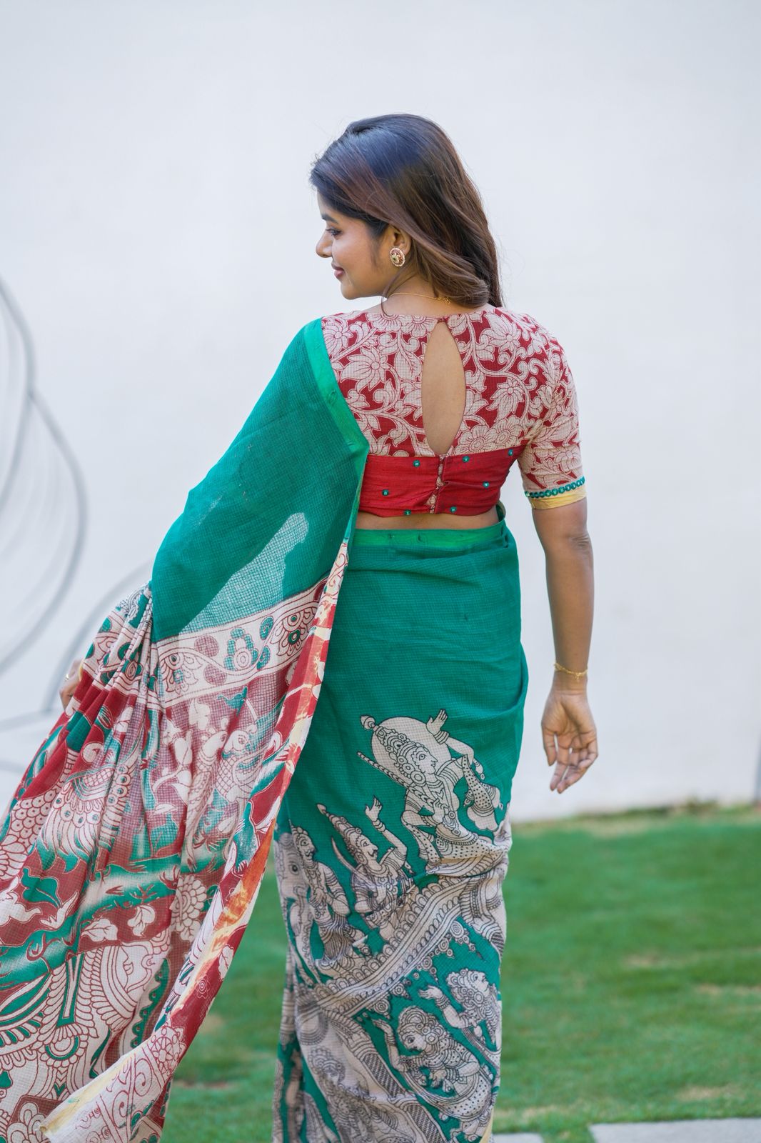 Green kota saree with kalamkari work blouse