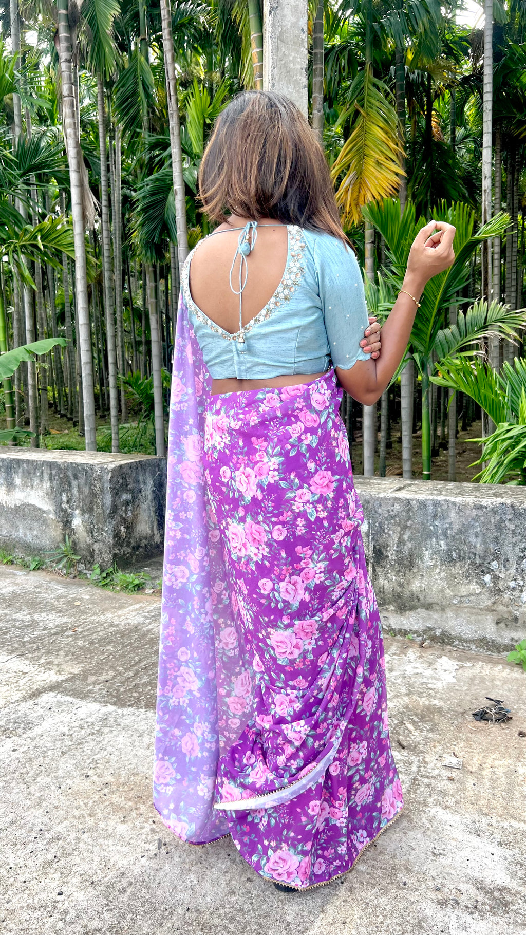 Purple floral georgette saree with hand worked blouse