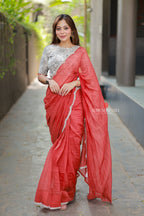 Orange rust saree with pearl work blouse