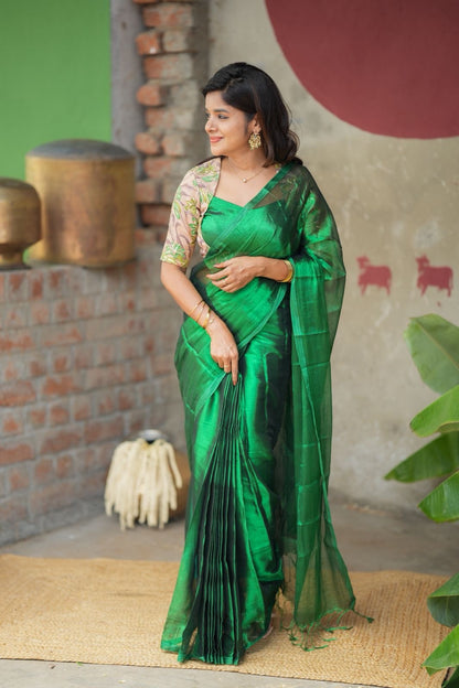 Green soft tissue saree with embroidered blouse