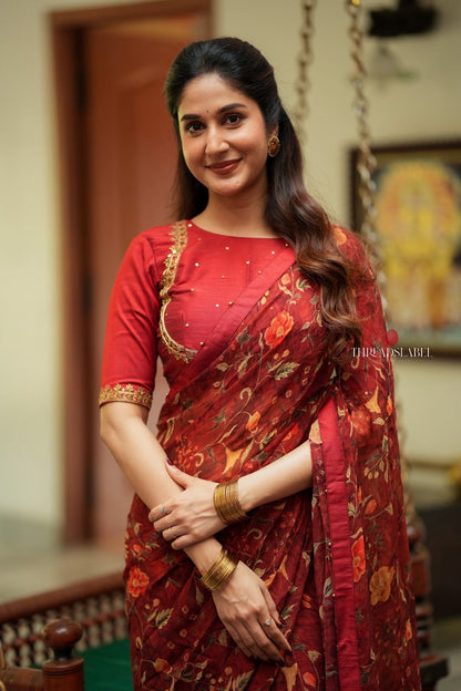 Maroon chiffon floral saree with hand work blouse