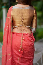 Orange rust saree with tissue handwork blouse