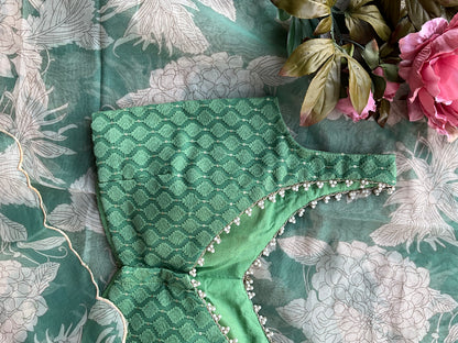 Green floral organza saree with emerald embroidery blouse