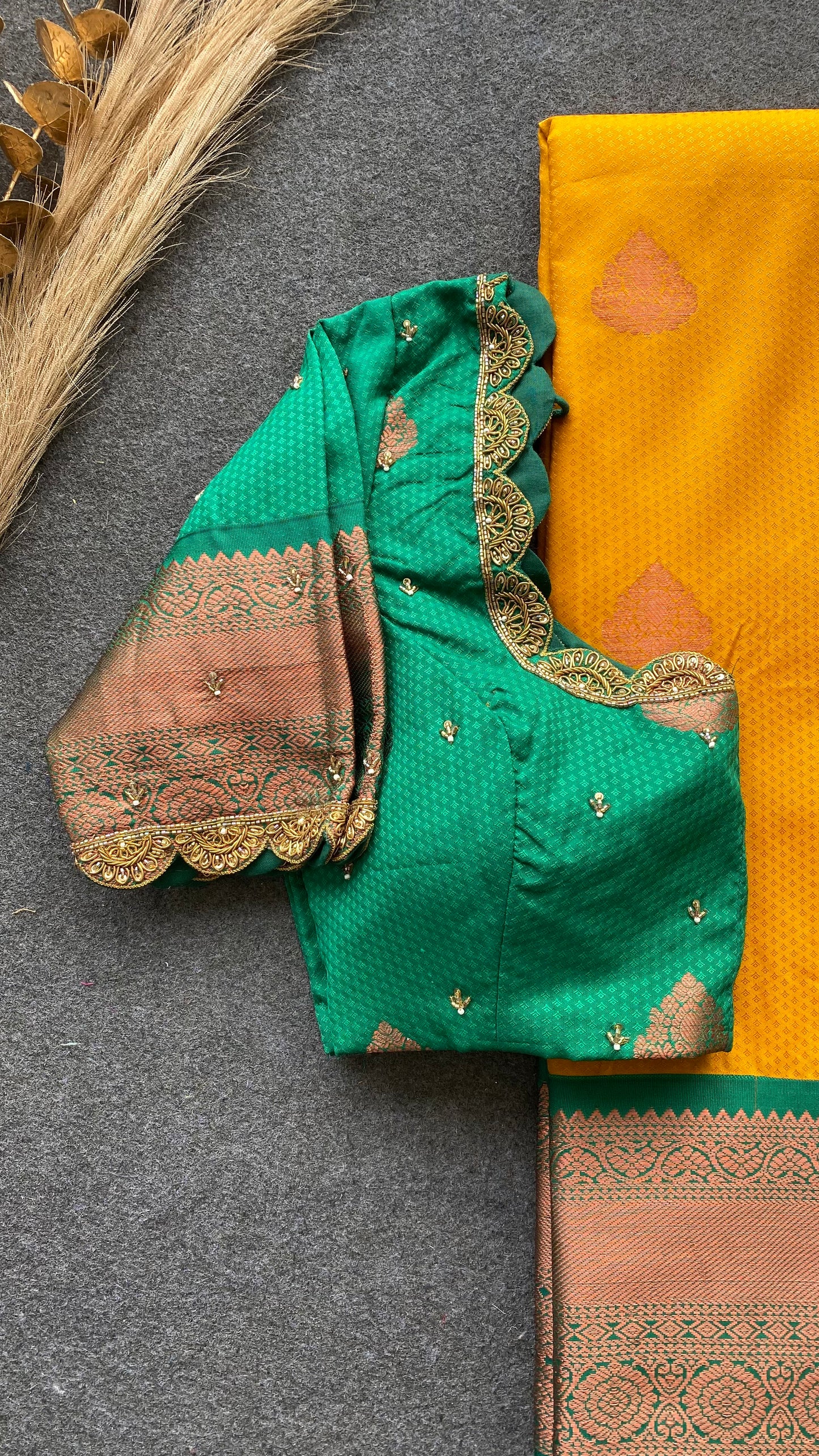 Yellow and green silk saree with hand work blouse