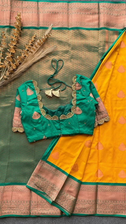 Yellow and green silk saree with hand work blouse