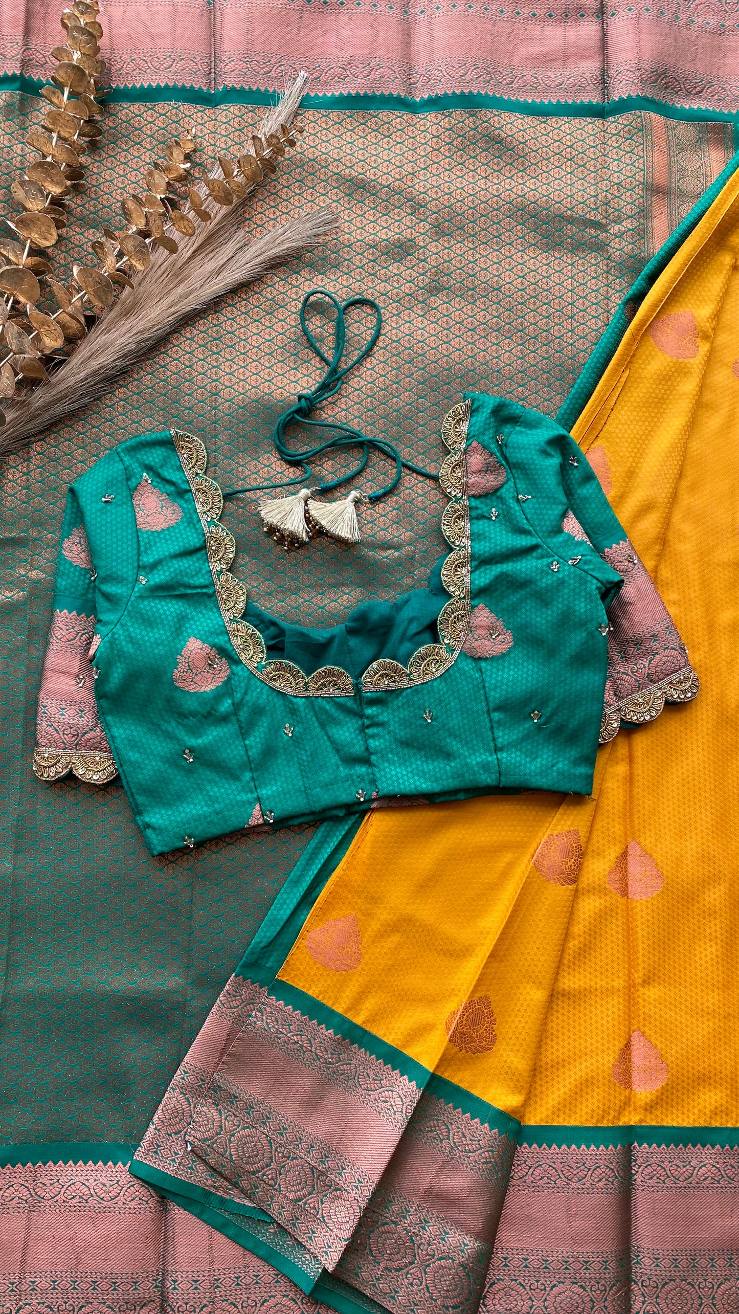 Yellow and green silk saree with hand work blouse