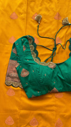 Yellow and green silk saree with hand work blouse