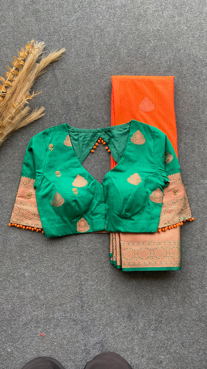 Orange and green silk saree with hand work blouse