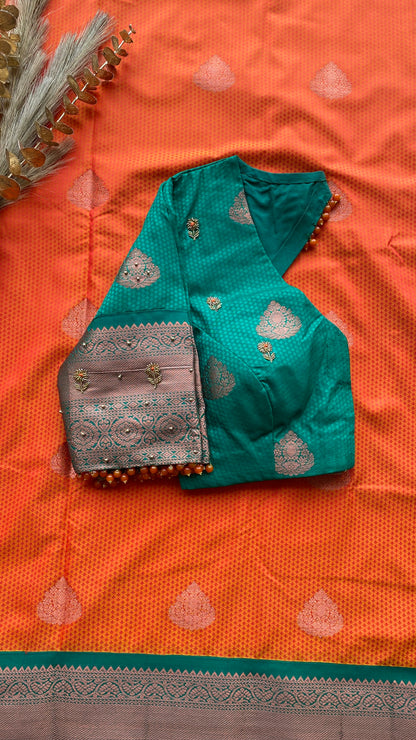 Orange and green silk saree with hand work blouse