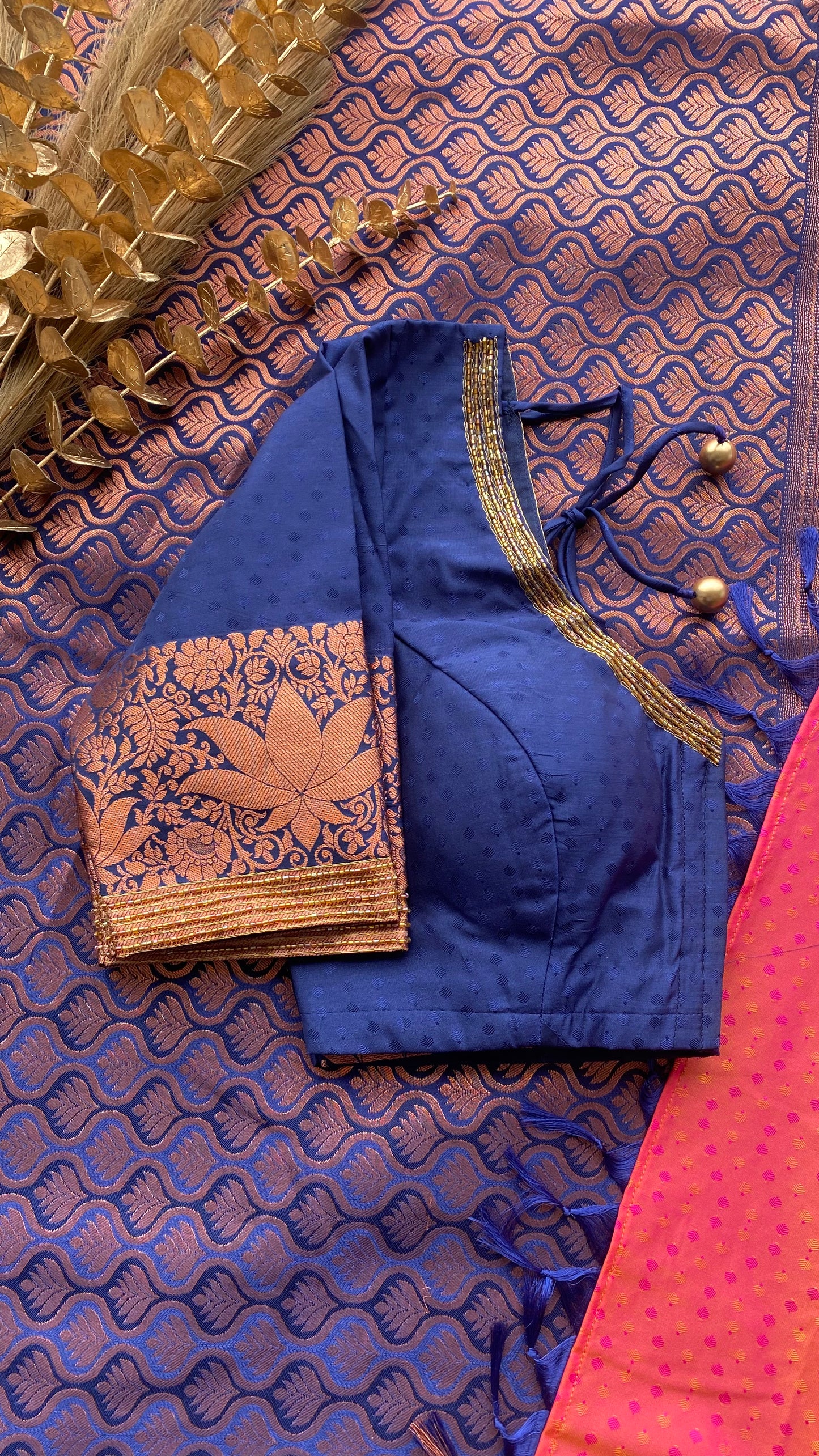 Peach and navy blue silk saree with hand work blouse