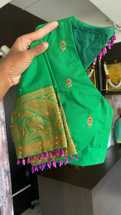 Rani pink and green silk saree with hand work blouse