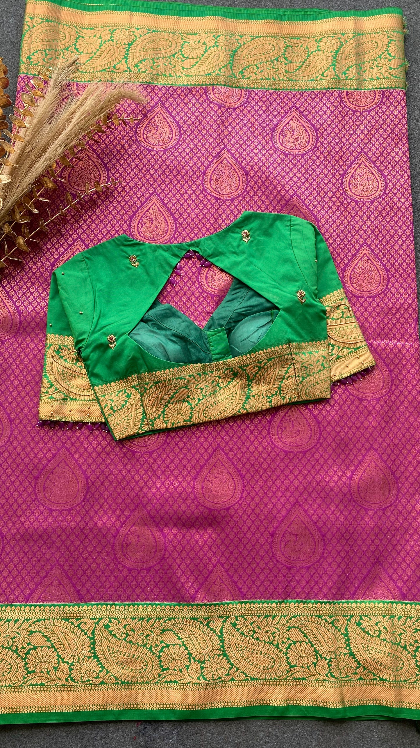 Rani pink and green silk saree with hand work blouse