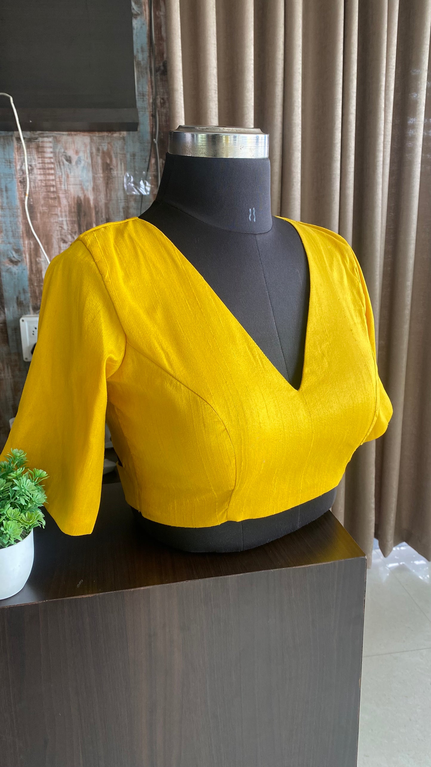 Yellow silk V neck patterned blouse