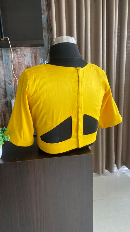 Yellow silk V neck patterned blouse