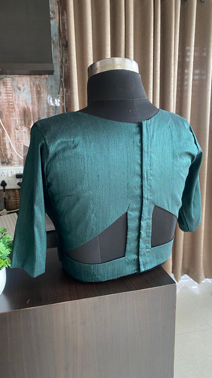 Bottle green silk V neck patterned blouse