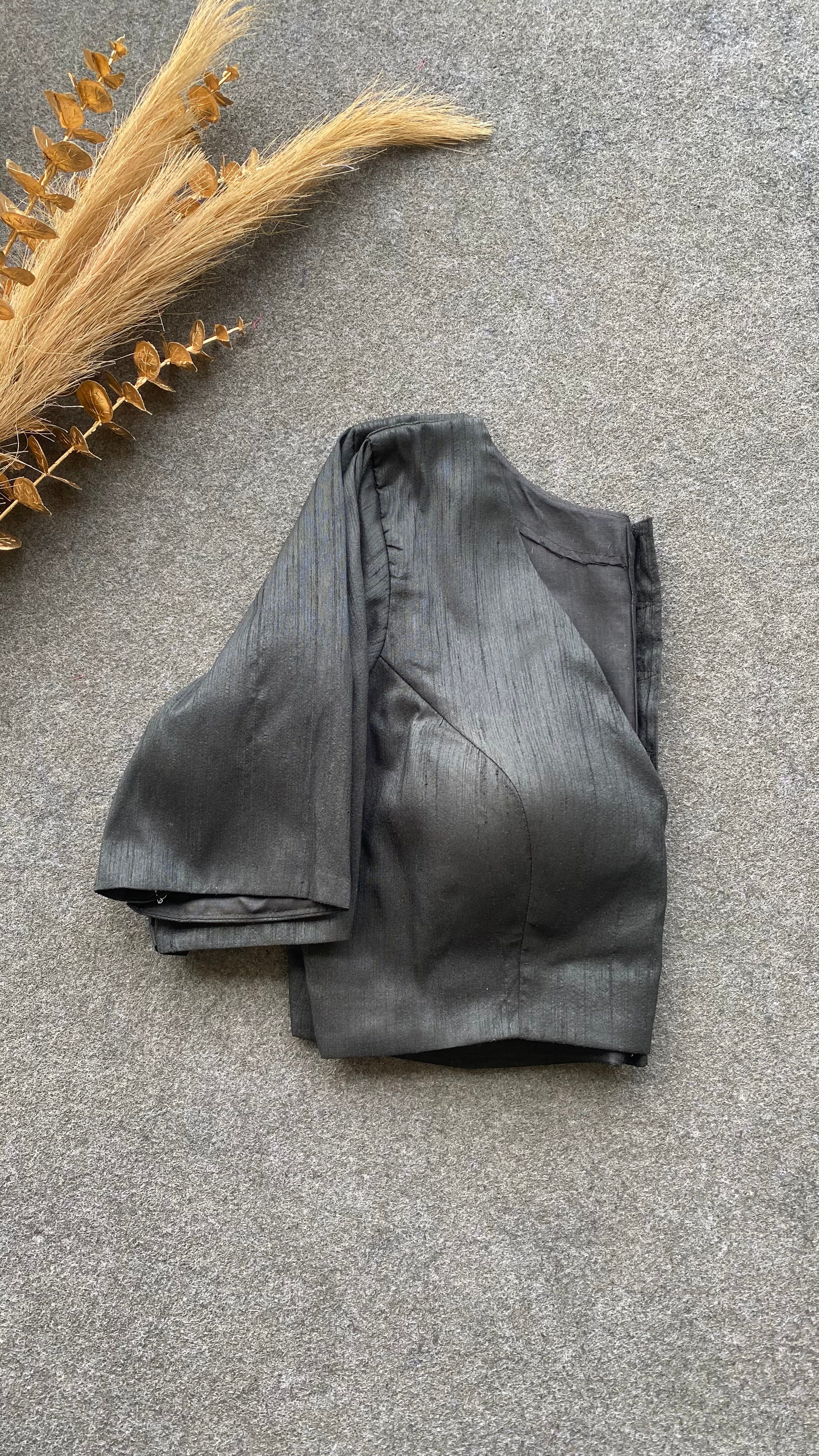 Black silk V neck patterned blouse