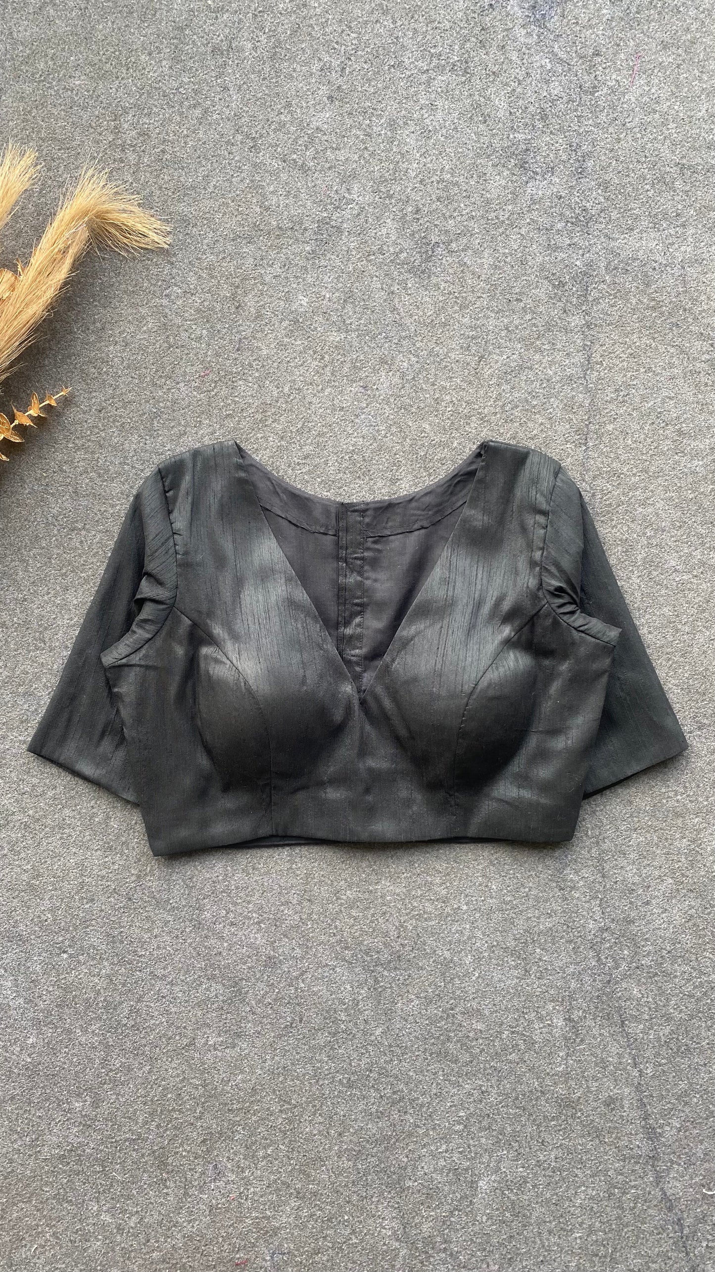 Black silk V neck patterned blouse